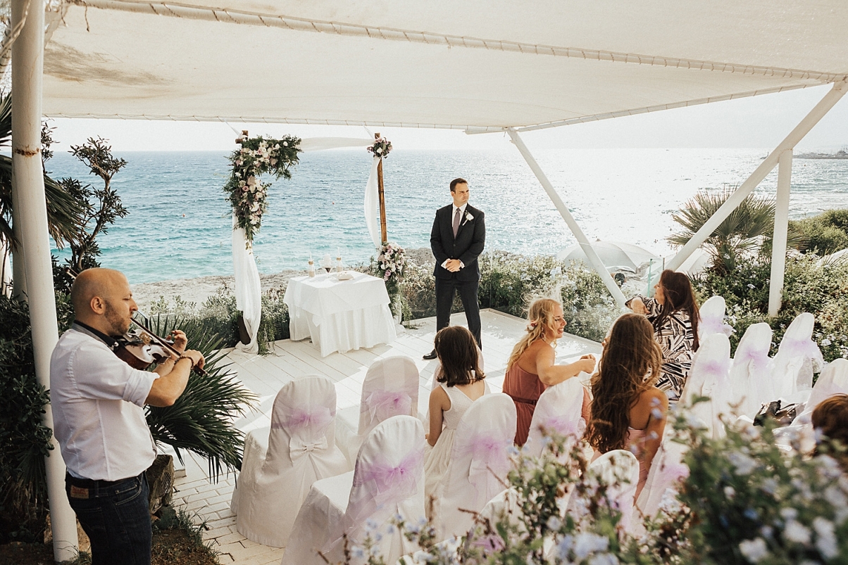 emotional-wedding-at-Grecian-bay-hotel-016